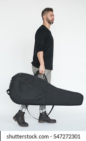 Man With Guitar Case Concept