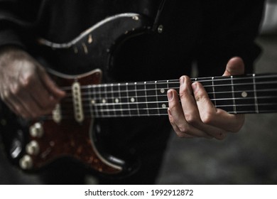 Man With A Guitar Vibes From A Music Video Shoot