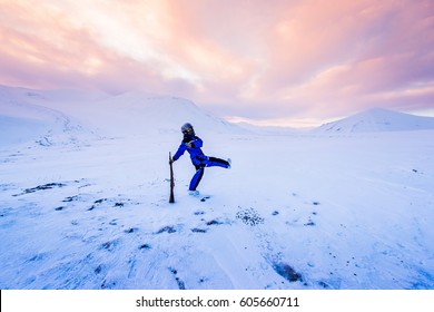 Man  With A Gun Extreme In Helmet Polar Explorer On The Background  Mountain Nature Svalbard Longyearbyen Svalbard Norway With Cloudly Blue Sky And Snowy Peaks  Wallpaper 