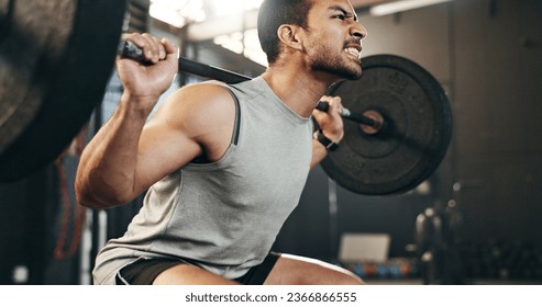 Man at gym, weight lifting and barbell with focus on muscle building endurance, strong body and balance power in fitness. Commitment, motivation and bodybuilder in workout for health and wellness.