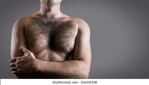 Man With Hairy Chest Isolated On Gray Background For Text