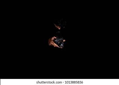 man with half frame camera