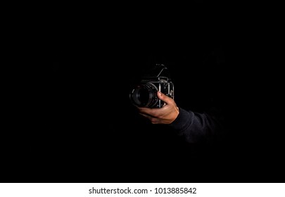 man with half frame camera