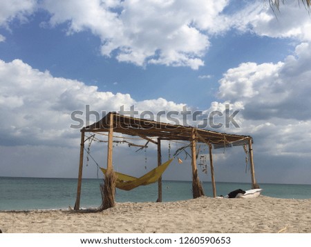 Man in hammock on the beach 