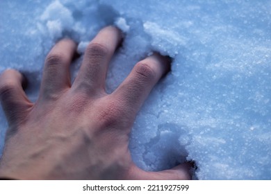 Man Hand In Cold Snow