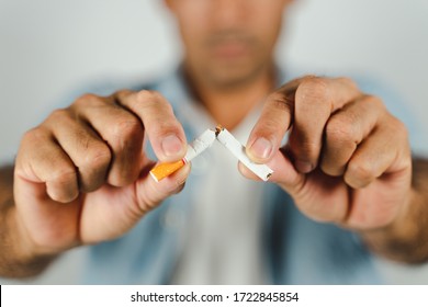 Man Hand Crushing Cigarette, Concept Quitting Smoking,World No Tobacco Day.