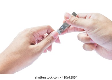 Man hand doing with nail clipper on white background. - Shutterstock ID 410692054