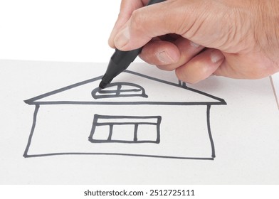 Man hand drawing of house with a black marker - Powered by Shutterstock