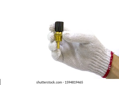 Man hand with engine coolant temperature sensor, water temp sensor, Isolated.