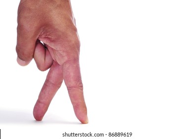 a man hand with its fingers simulating someone walking or running