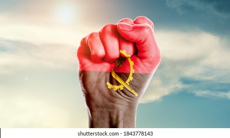 Man Hand Fist Of Angola Flag Painted