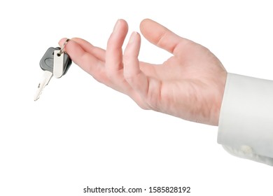 Man Hand Giving Or Offering Keys To Someone. Isolated On White, Clipping Path Included