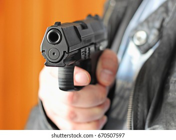 Man Hand Gun Pistol Rubber Attack Stock Photo 670507597 | Shutterstock