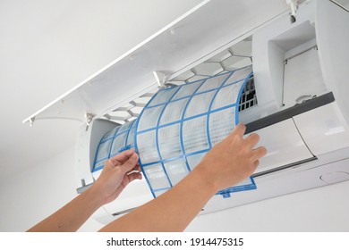 Man Hand Hold Air Conditioner Filter Cleaning Concept