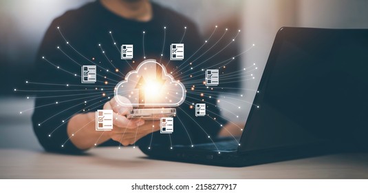 Man hand hold smartphone with tablet and data information on the Cloud Computing Technology Internet Storage Network,  big data Through internet technology, Cloud sharing download and upload