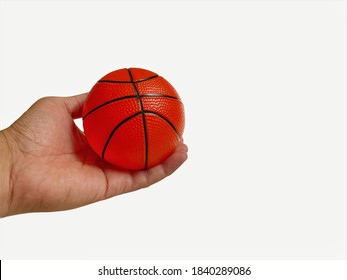 Man Hand Holding Basketball On White Background