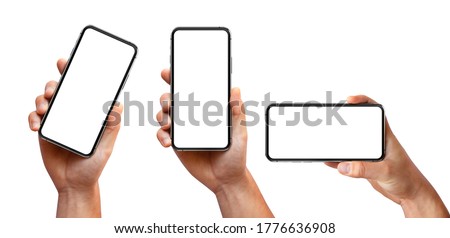 Man hand holding the black smartphone with blank screen and modern frameless design three positions angled, vertical and horizontal - isolated on white background