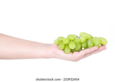 Man Hand Holding A Bunch Of Green Grapes, Isolated On White Background.