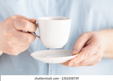 Man Hand Holding Coffee Or Tea Mug