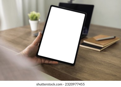 man hand holding digital tablet touch white screen device isolated screen ONLINE ADVERTISING communication empty space frame mockup, internet touchpad touchscreen information ipad - Powered by Shutterstock