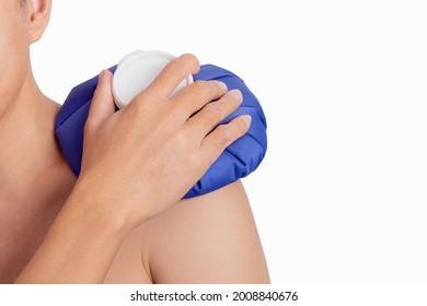 Man Hand Holding Ice Pack Bag Compress To The Shoulder. Reduce Pain And Swelling