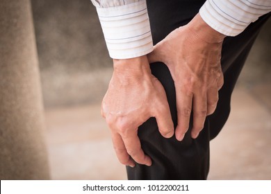 Man Hand Holding Knee Joint Pain, Osteoporosis, Gout, Knee Bone Joint Problem Issue