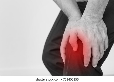 man hand holding knee joint pain, osteoporosis, gout, knee bone joint problem issue