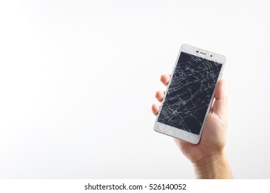 Man Hand Holding Mobile Phone With Broken Screen