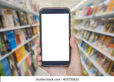 Man Hand Holding Mobile Smart Phone , Tablet,cellphone Over Blur Shop Background In Book Store Shelf Natural Bokeh Out Of Focus Bookstore,Blur Background Of People In Library,book Store.vintage Photo