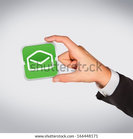 Man hand holding object (letter icon) High resolution