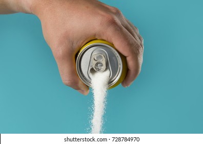 Man Hand Holding Refresh Drink Can Pouring Sugar Stream In Sweet And Calories Content Of Soda And Energy Drinks Concept In Unhealthy Nutrition And Diet Concept