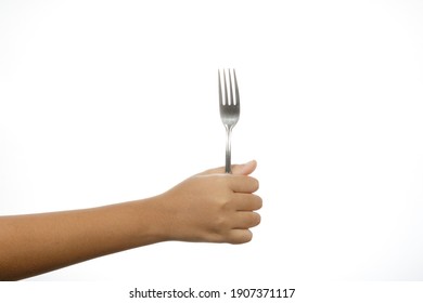 A Man Hand Holding A Silver Fork Isolate On White Background