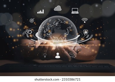 Man Hand holding virtual Global with technology and business icon for metaverse world. Globalisation and Digital business technology transformation concept.