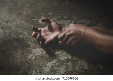 Man Hand Holding A Woman Hand For Rape And Sexual Abuse Concept