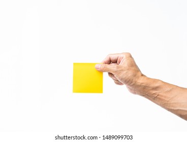 Man hand holding yellow post it on white background