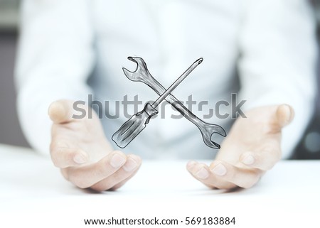 man hand  mechanic tools in the screen