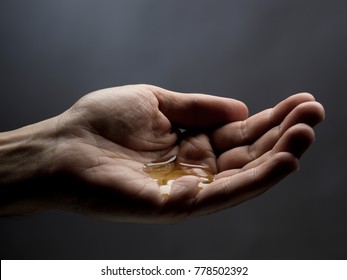 man hand with oil
