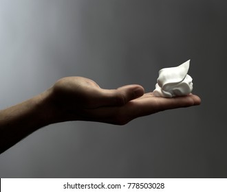 Man Hand With Oil Shaving Foam