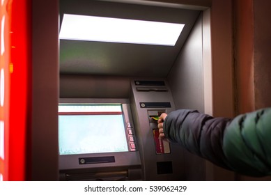 Man Hand On Atm,taking Card In Night