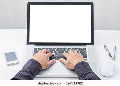 Man Hand On Laptop Keyboard With Blank Screen Monitor