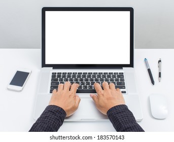 Man Hand On Laptop Keyboard With Blank Screen Monitor