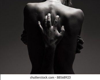 Man Hand On Sexy Woman Back