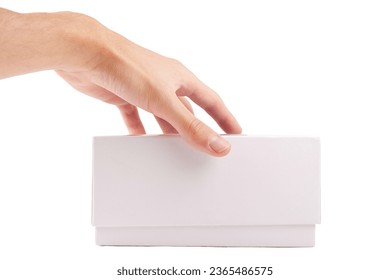 Man, hand opening a simple blank empty white box packaging for smartphone mobile phone, side view, unbranded generic box product unboxing concept, object isolated on white background, cut out, nobody - Shutterstock ID 2365486575