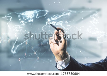 Man hand with pen working with abstract creative digital world map on blurred office background, globalization concept. Multiexposure