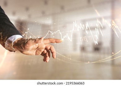 Man hand presses on abstract virtual financial graph on blurred office background, financial and trading concept. Multiexposure