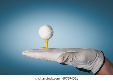 Man Hand In Professional Golf Glove Holding Golf Equipment