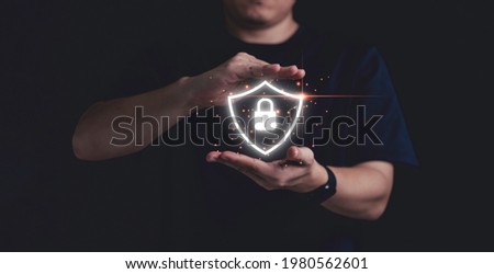 Man hand protect virtual key lock for data security information and technology concept.