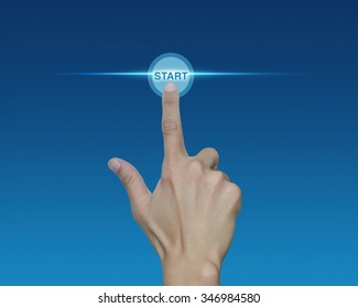 Man hand push start button on touch screen over blue background
