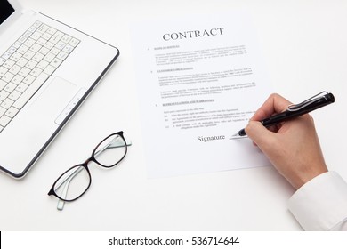 man hand sign on contract document with fountain pen, glasses and notebook on white backgrounds - Shutterstock ID 536714644