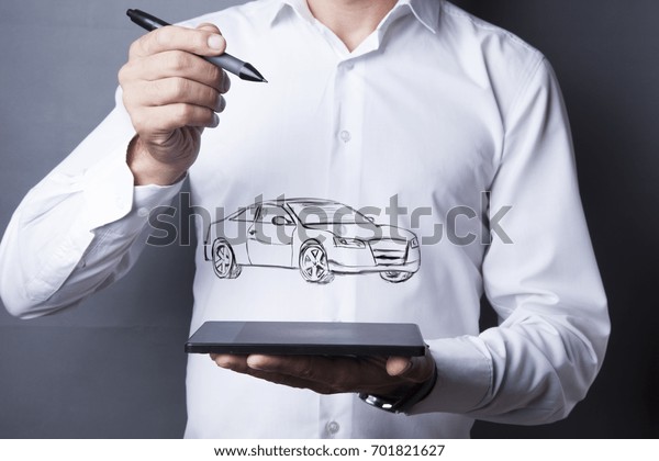 man hand tablet
with car on virtual screen